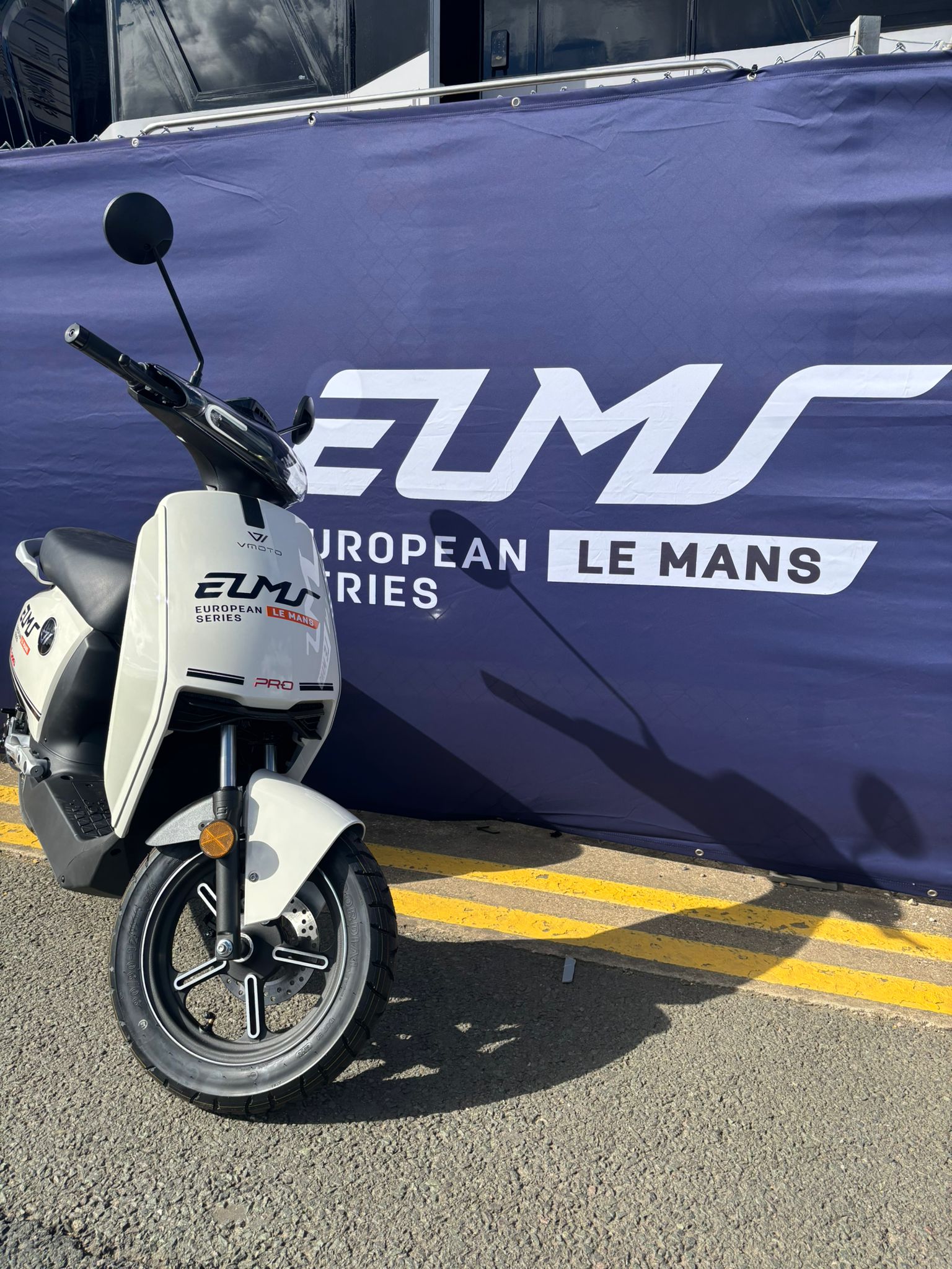 Vmoto electric paddock scooter parked up at the European Le Mans Series, Silverstone