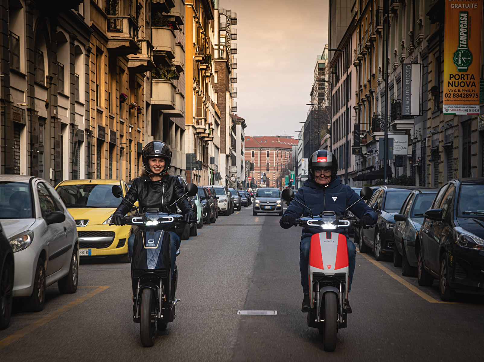 Super Soco CUx electric scooter Ducati Edition being ridden in Milan